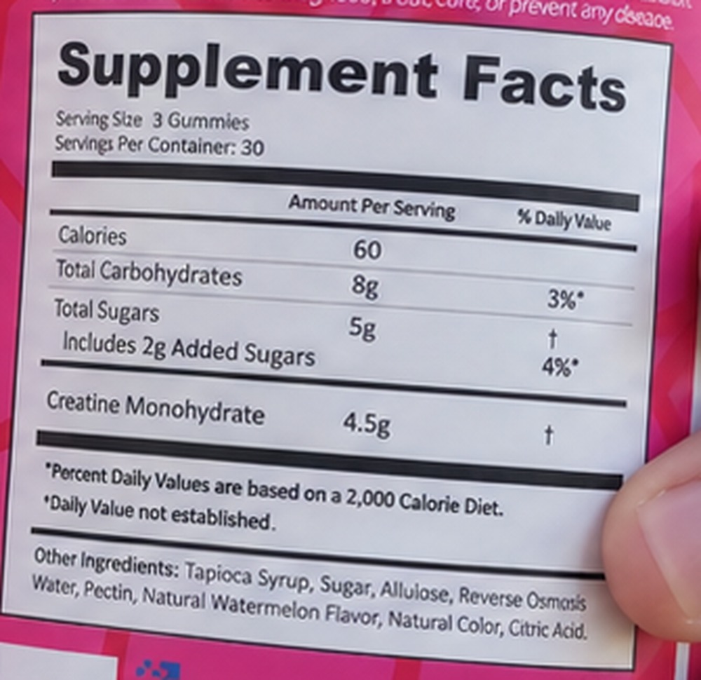 Supplement Facts panel photographed from a Create Creatine Gummies Watermelon tub: serving size 3 gummies, 30 servings per container, 60 calories, 8 g total carbohydrates, 5 g total sugars including 2 g added sugars, 4.5 g creatine monohydrate